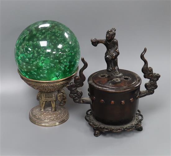 An Indian silvered copper elephant stand, with glass paperweight and a Japanese bronze koro